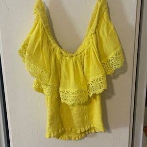 Yellow sleeveless crop top